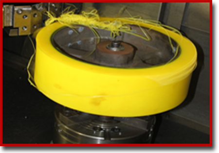 trimming a large urethane guide roller