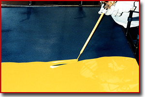 Pouring urethane into mold for cast sheets